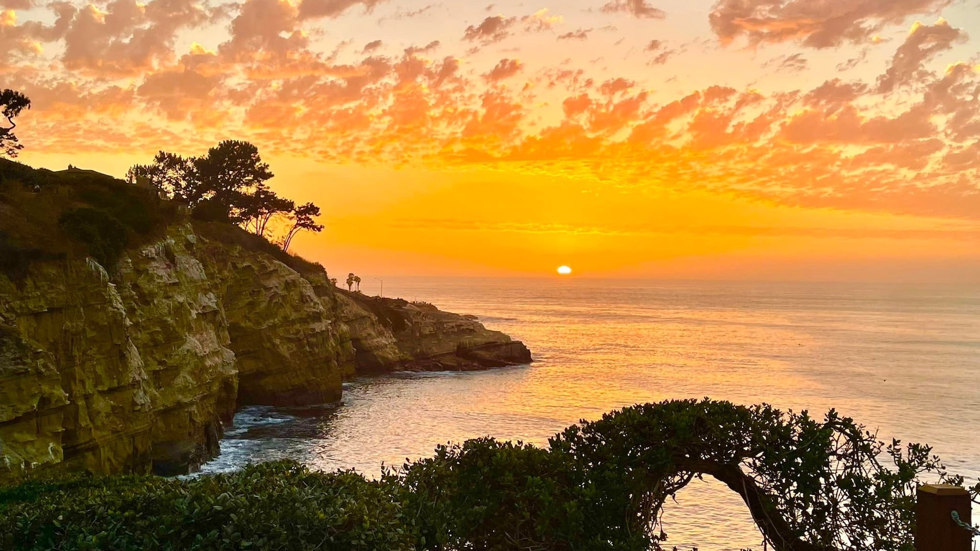 sunset view of the beach from the mountain